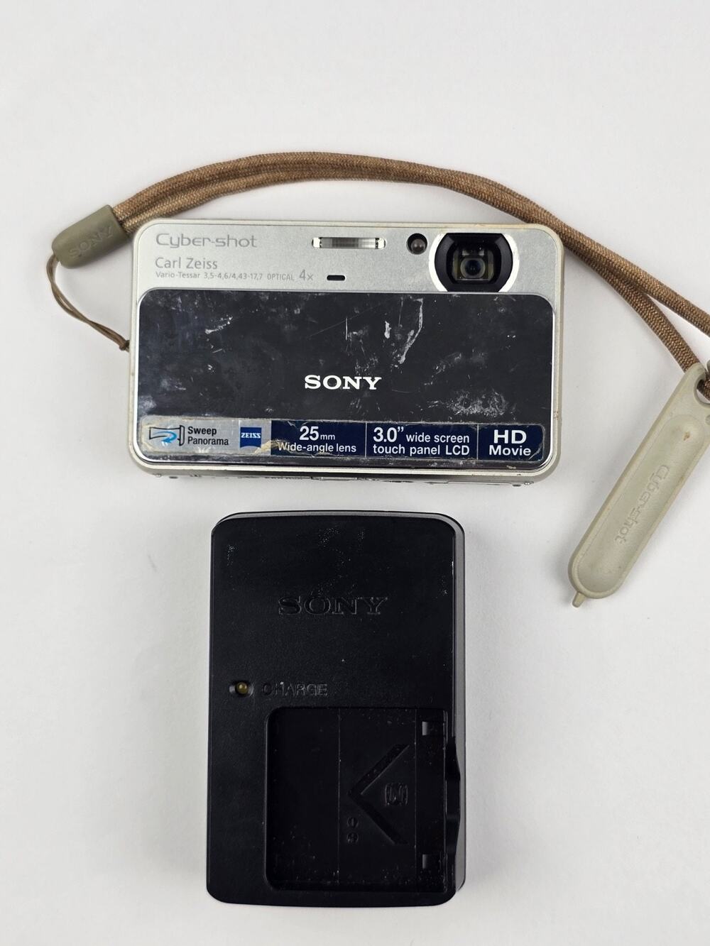 Sony Cyber-Shot DSC-T110 Silver Digital Camera 16.1 MP "slider" w/ charger works